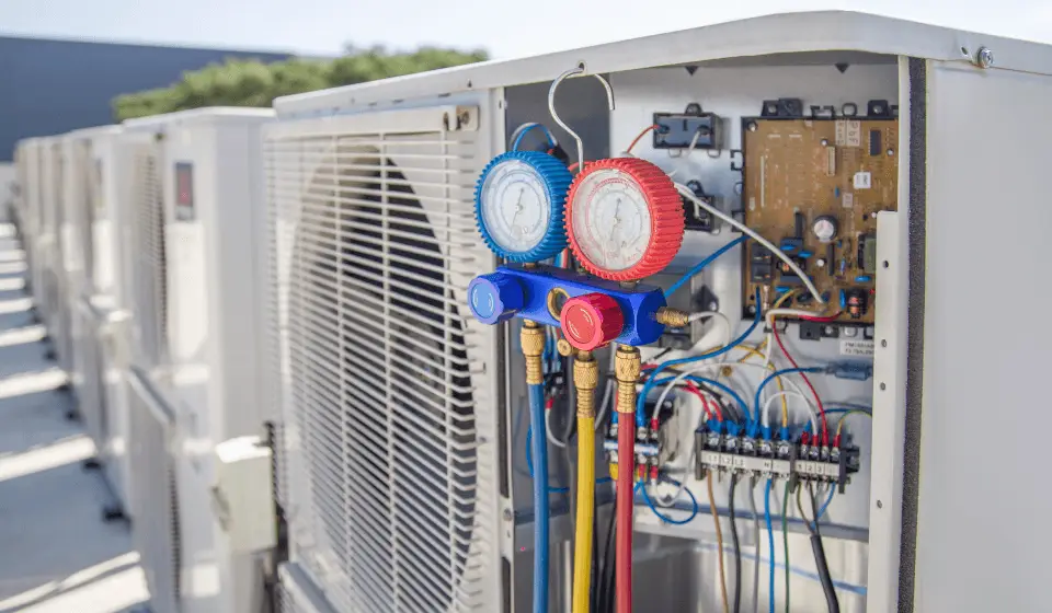 Zamori team performing HVAC maintenance on chiller